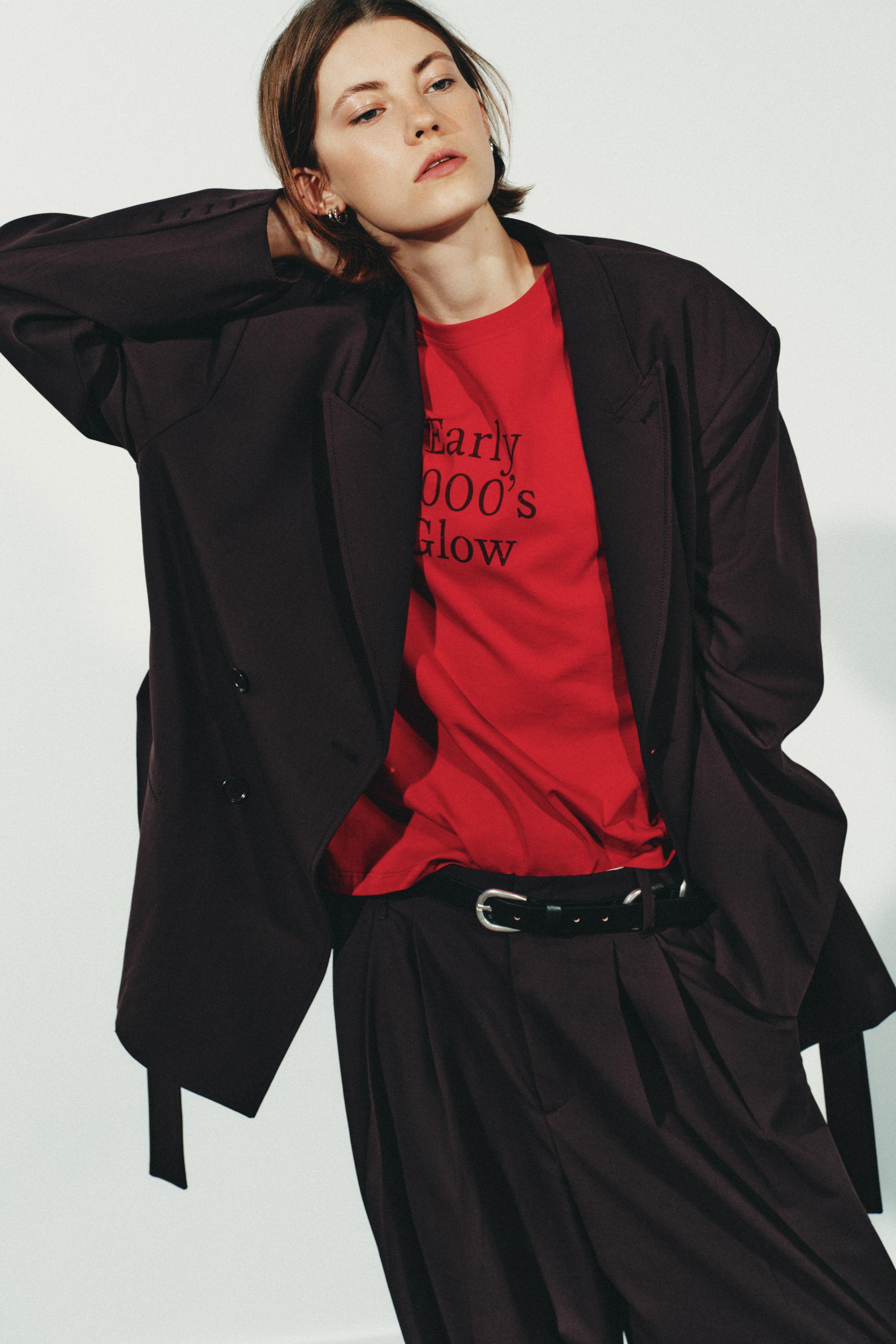 PLEATED PANTS WITH BUTTON HEM